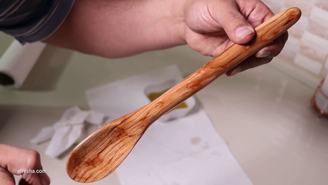 power carving wooden spoon from Almond wood, with olive oil finish to show wood grain